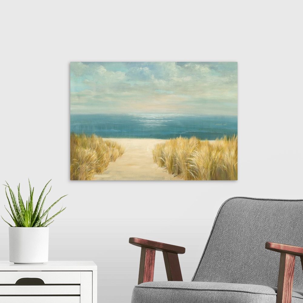 A modern room featuring Contemporary seascape painting of a sandy beach with grasses at the edge of the ocean.