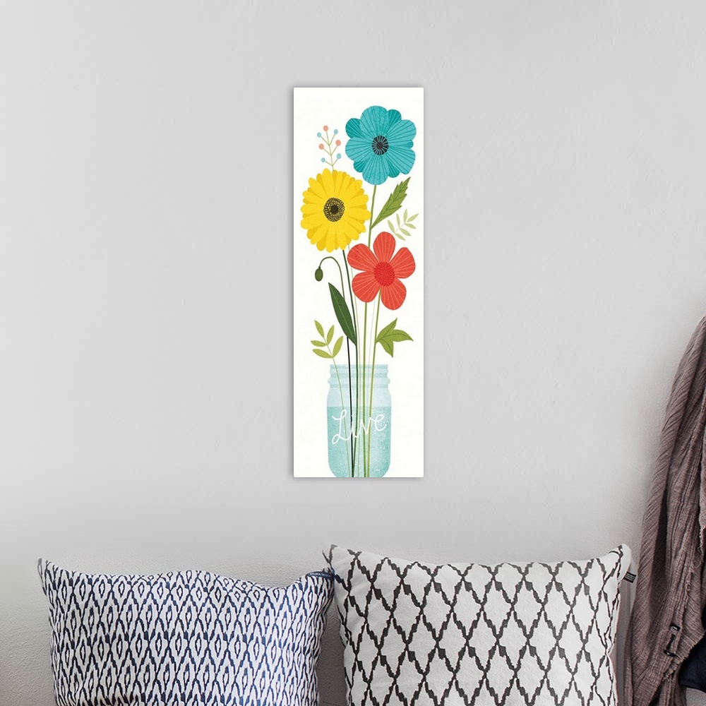 A bohemian room featuring Tall, rectangular art of wildflowers in a mason jar with the word "Live" etched on it.