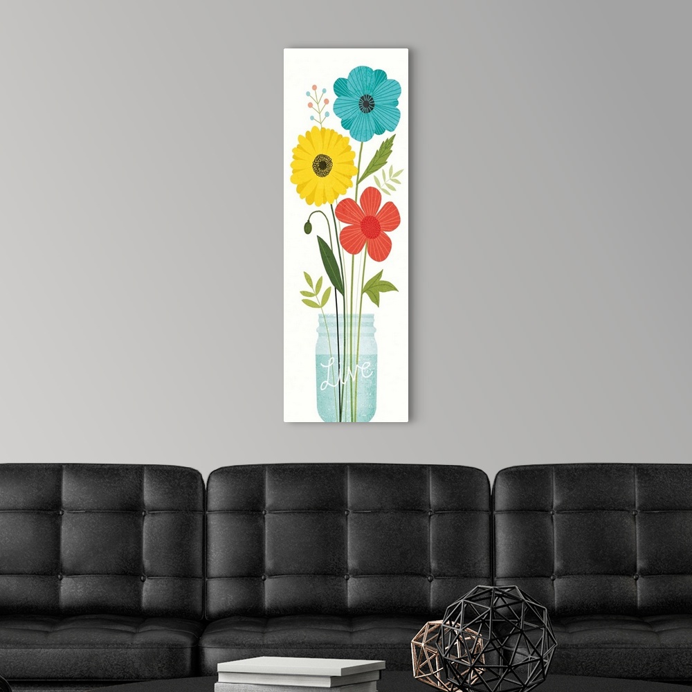 A modern room featuring Tall, rectangular art of wildflowers in a mason jar with the word "Live" etched on it.