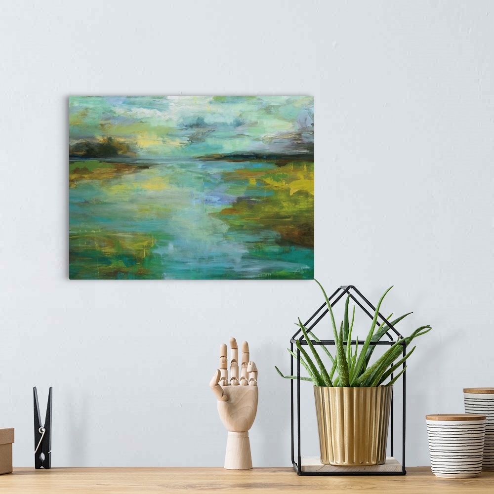 A bohemian room featuring Contemporary painting of a stream running through a landscape.