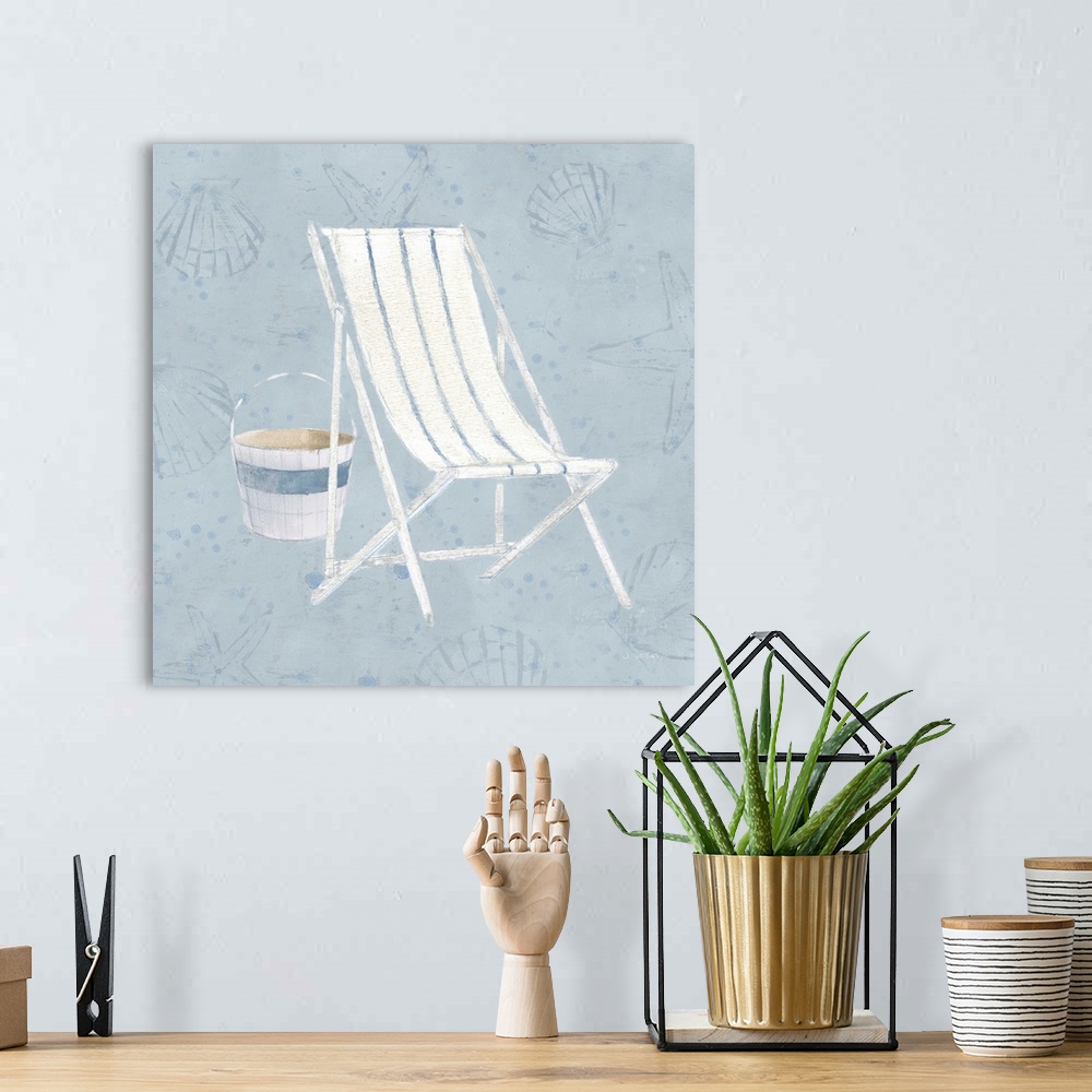 A bohemian room featuring Square art with an illustration of a white beach chair with blue stripes and a bucket on a light ...