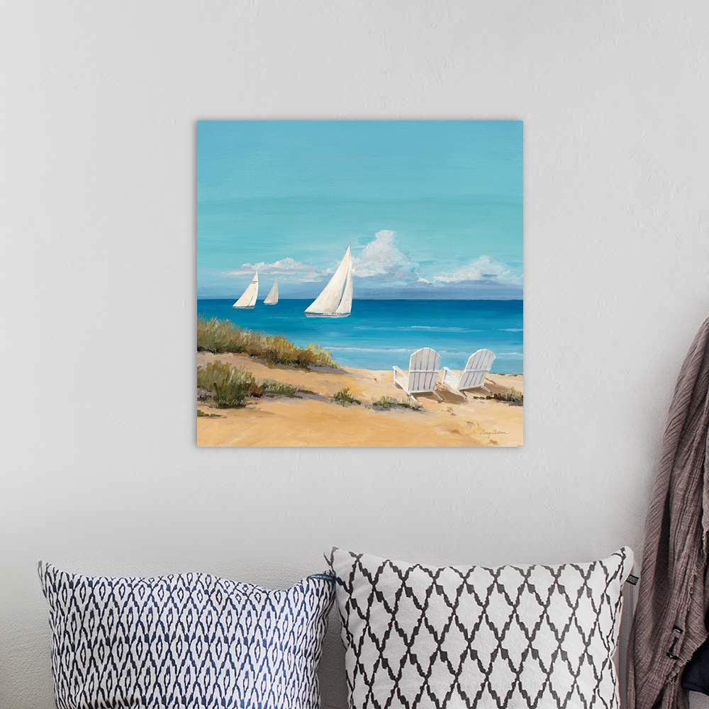 A bohemian room featuring Large contemporary art shows a trio of sailboats traveling through the open waters of an ocean on...