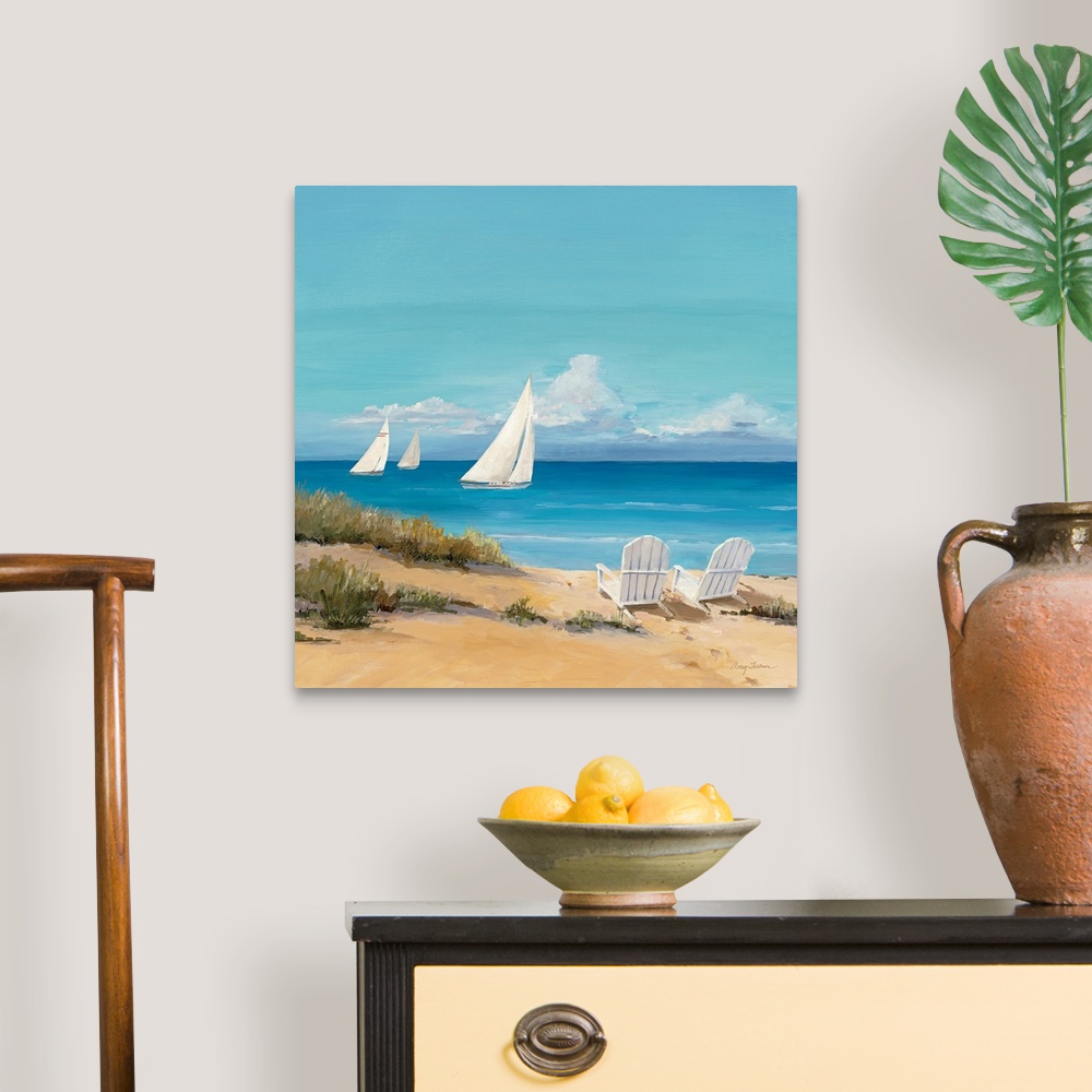 A traditional room featuring Large contemporary art shows a trio of sailboats traveling through the open waters of an ocean on...