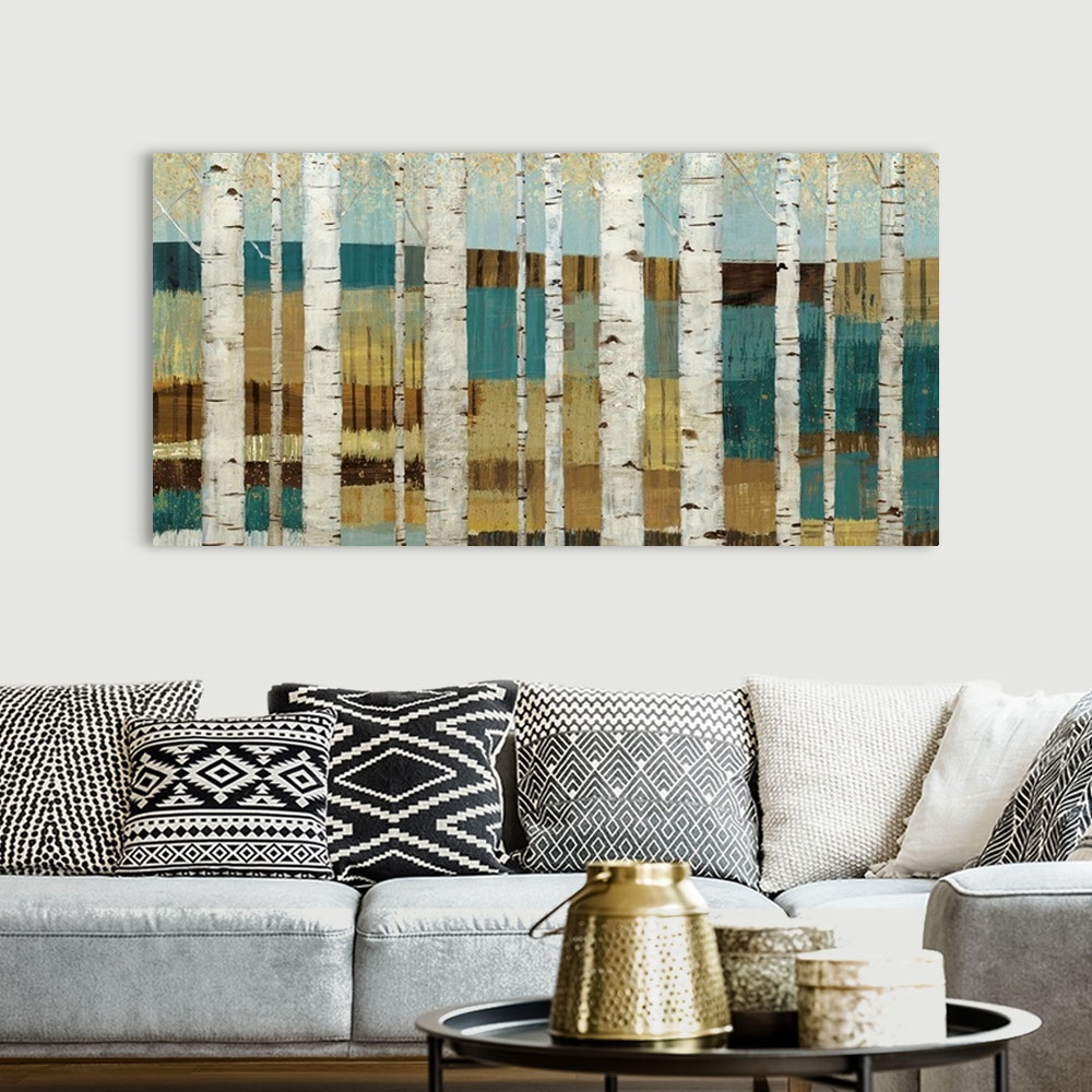 A bohemian room featuring Huge canvas art shows a forest of birch trees sitting in front of a valley.  Artist uses multiple...