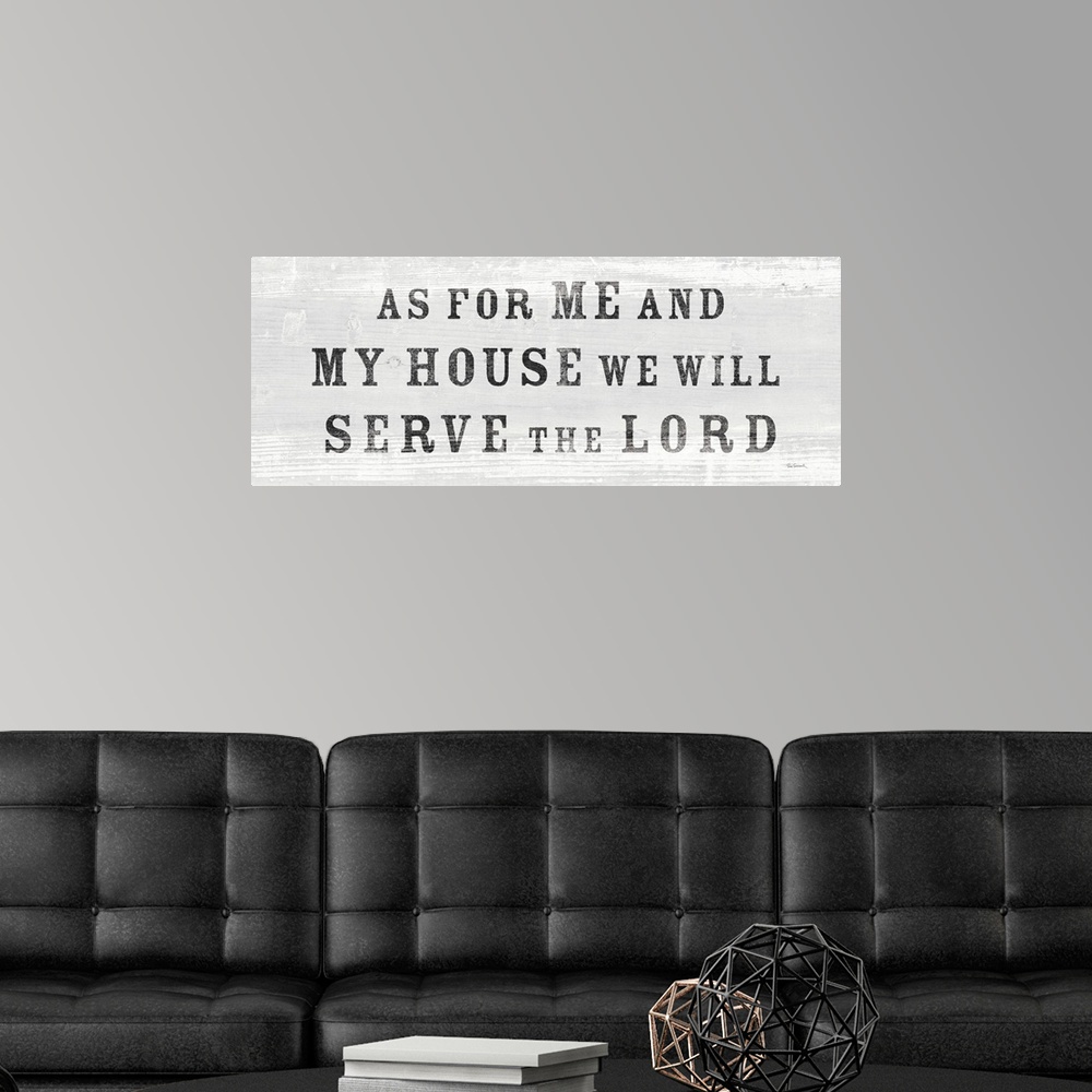 A modern room featuring "As For Me And My House We Will Serve The Lord" against a light gray shiplap background.