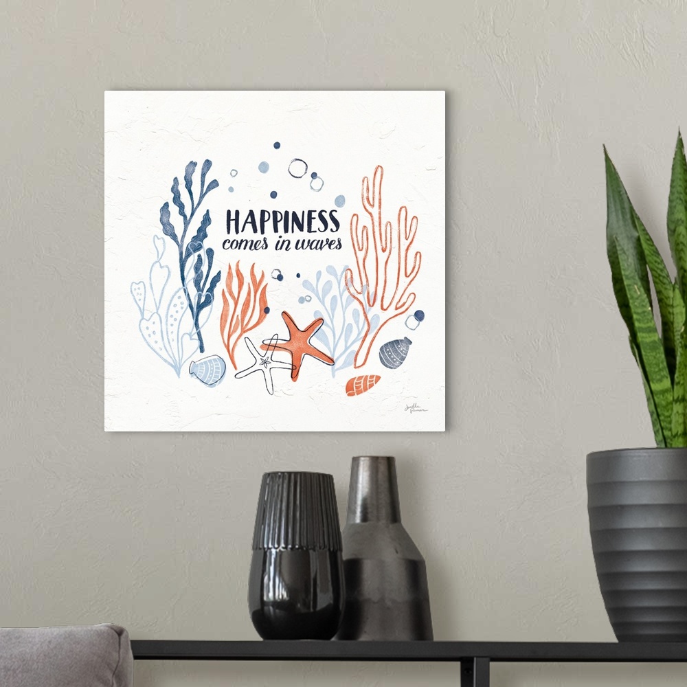 A modern room featuring "Happiness Comes in Waves" with coral and blue ocean themed illustrations on a square white textu...