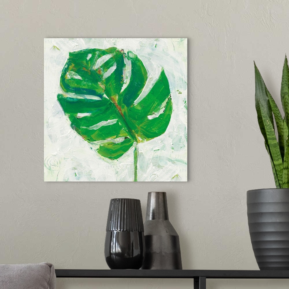 A modern room featuring Square abstract painting of a big, green, tropical leaf on a white textured background.