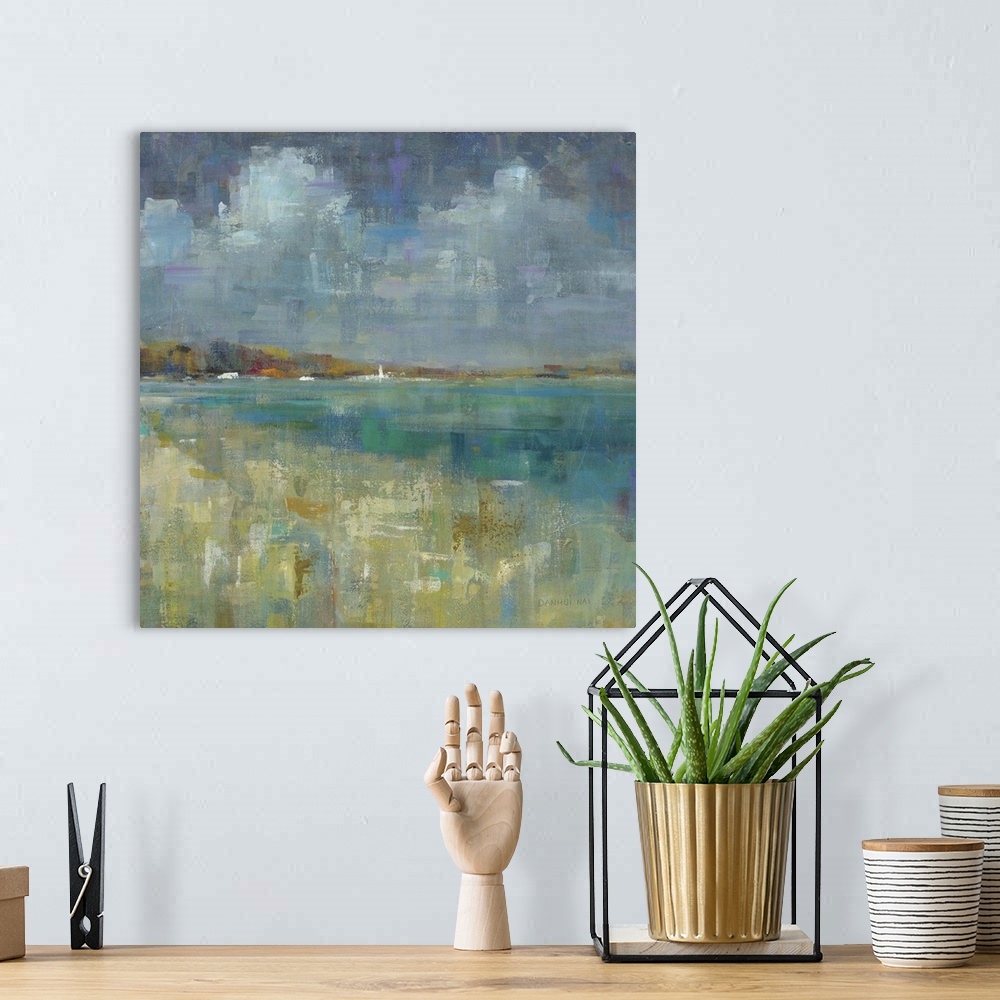 A bohemian room featuring Square abstract painting of the ocean and seashore made with short and small brushstrokes of color.