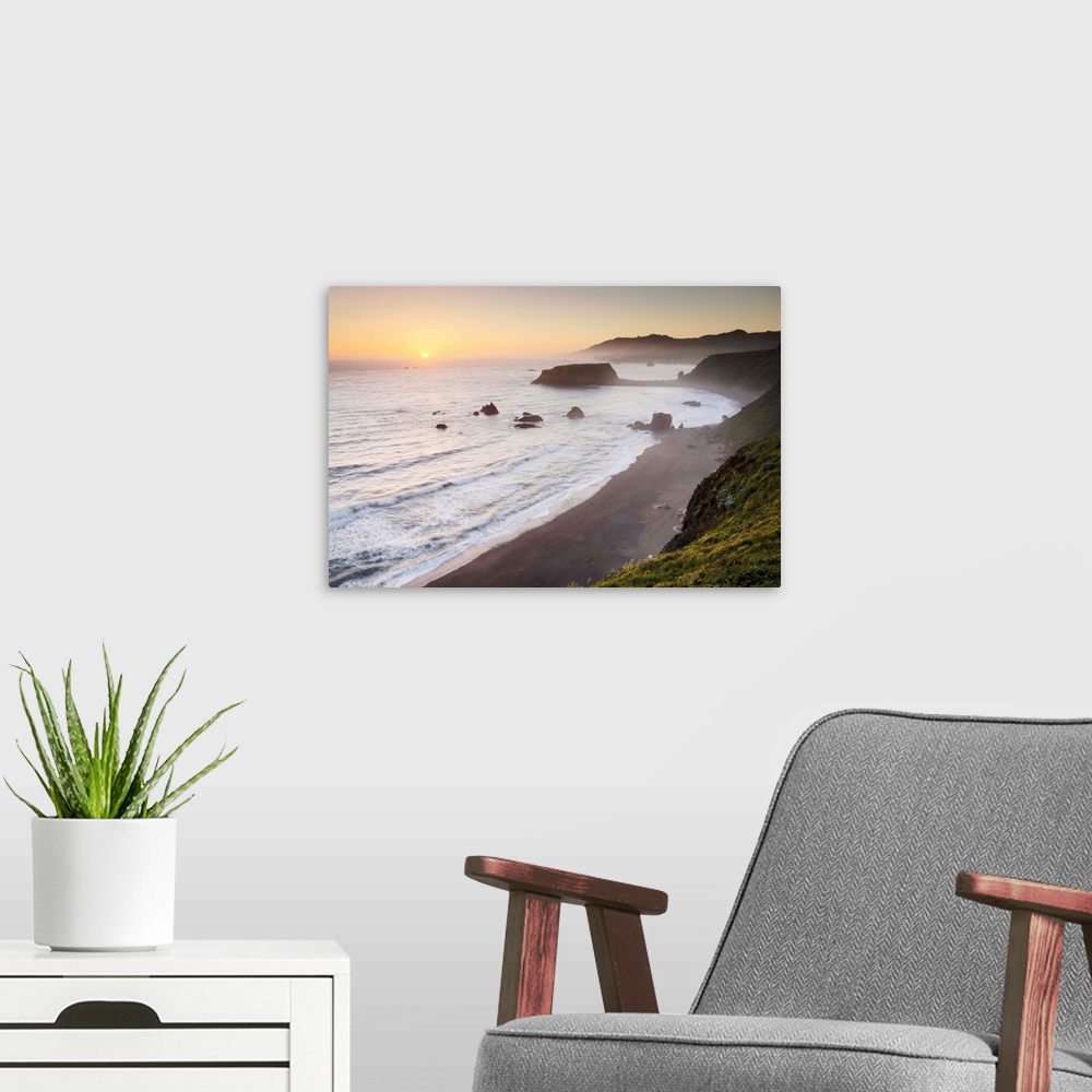 A modern room featuring Sunset view of surf beaches and Goat Rock from rugged cliffs and bluffs of Sonoma Coast State Par...