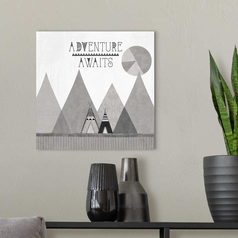 A modern room featuring A square decorative design of tents along mountains with the text 'Adventure Awaits', all in grey...