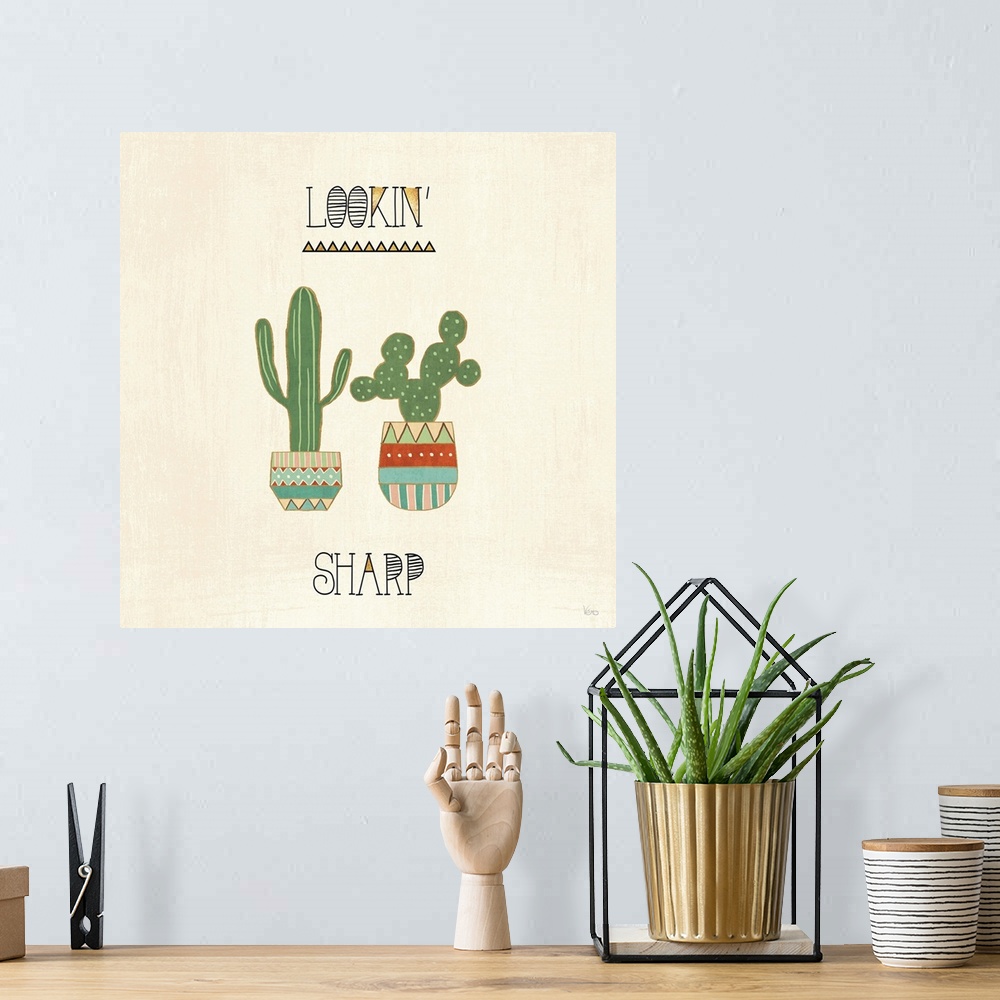 A bohemian room featuring "Lookin' Sharp" with two cactus in southwestern designed pots on a beige backdrop.
