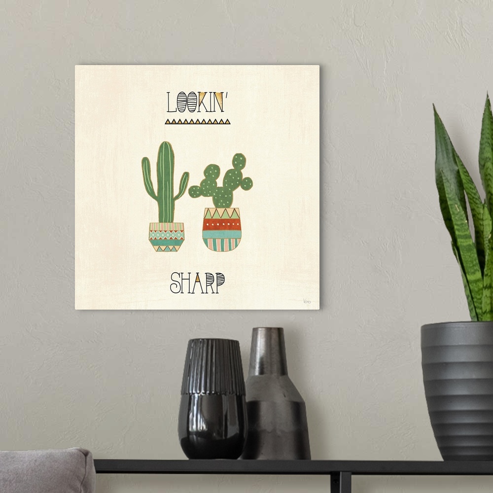 A modern room featuring "Lookin' Sharp" with two cactus in southwestern designed pots on a beige backdrop.