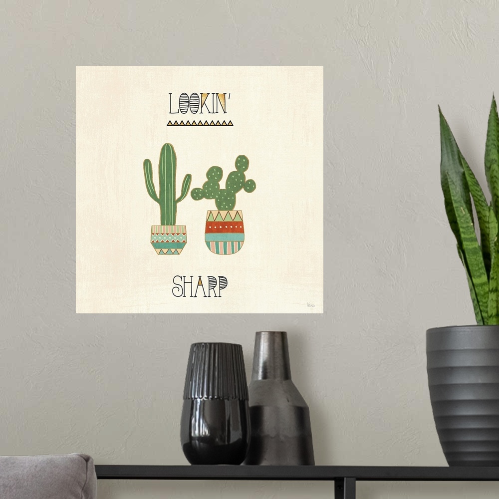 A modern room featuring "Lookin' Sharp" with two cactus in southwestern designed pots on a beige backdrop.