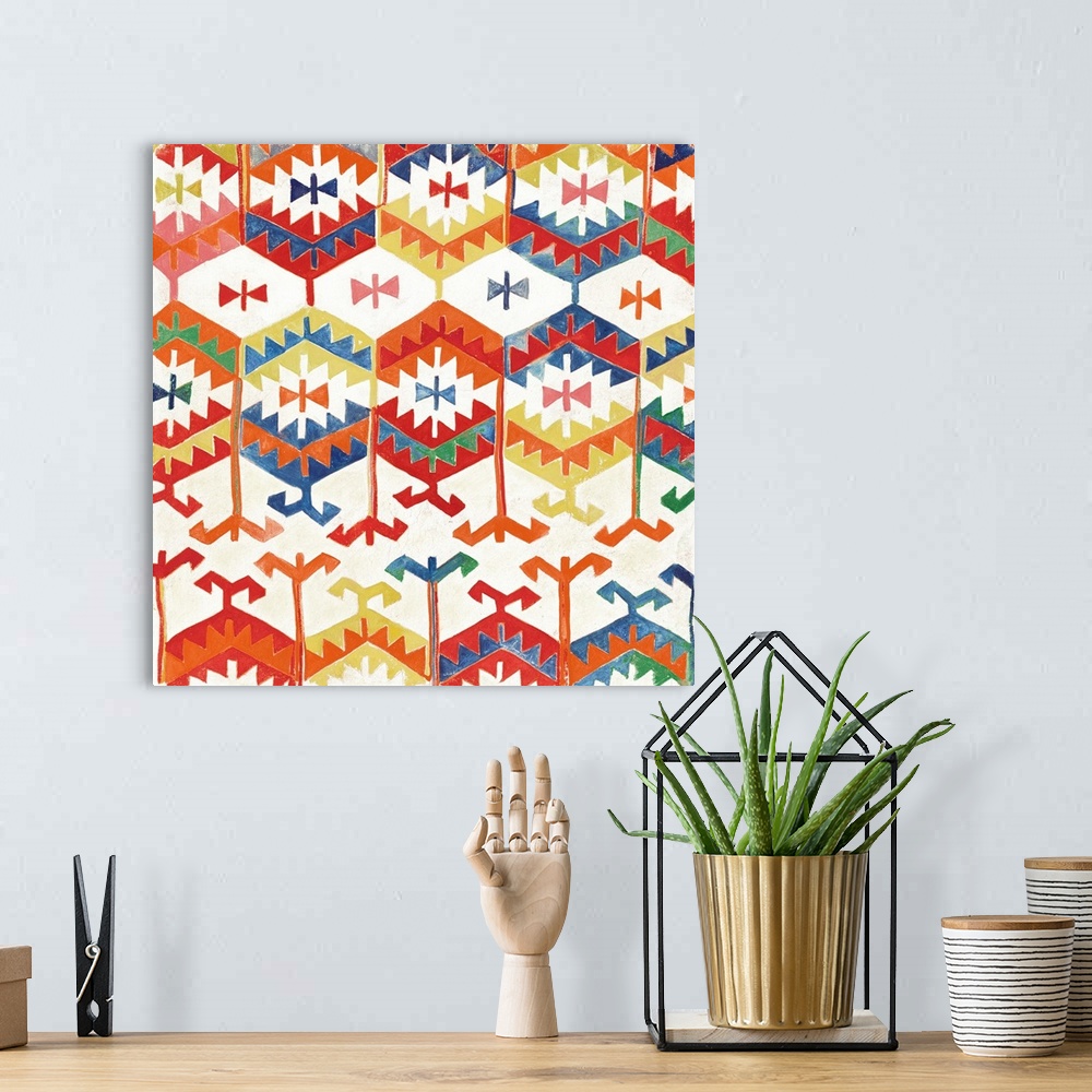 A bohemian room featuring Square artwork of repetitive southwest patterns in green, yellow, blue, orange and red.