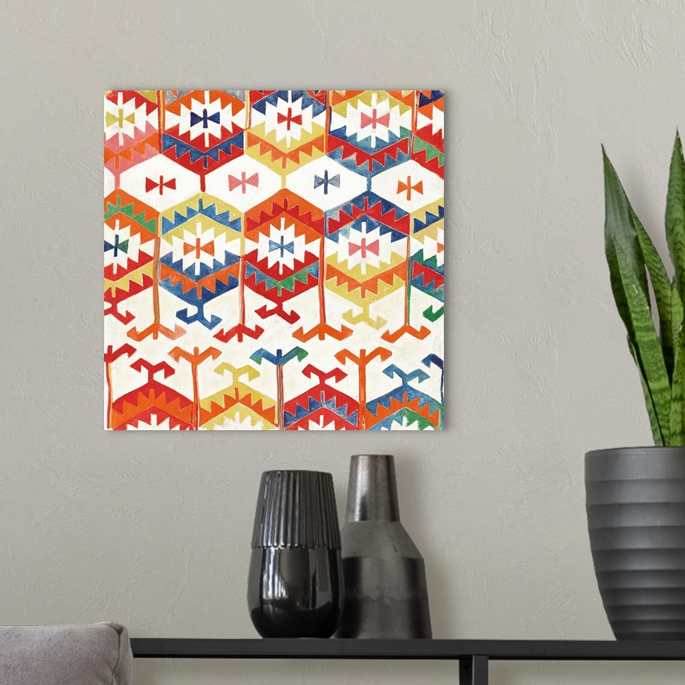 A modern room featuring Square artwork of repetitive southwest patterns in green, yellow, blue, orange and red.