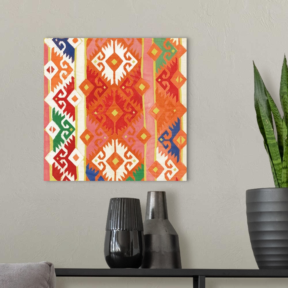 A modern room featuring Square artwork of southwest patterns in green, yellow, blue, orange and red.