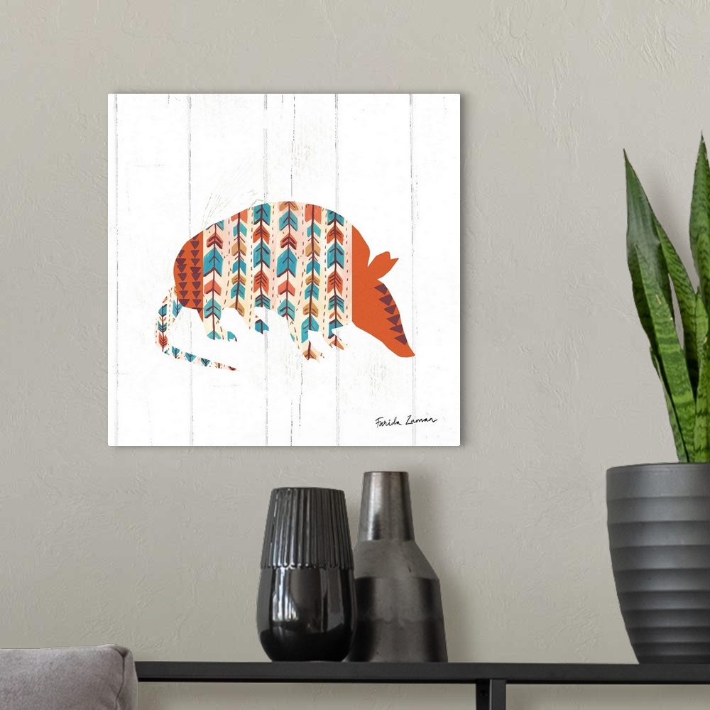 A modern room featuring An illustration of an armadillos with a southwestern pattern on a white wood panel background.