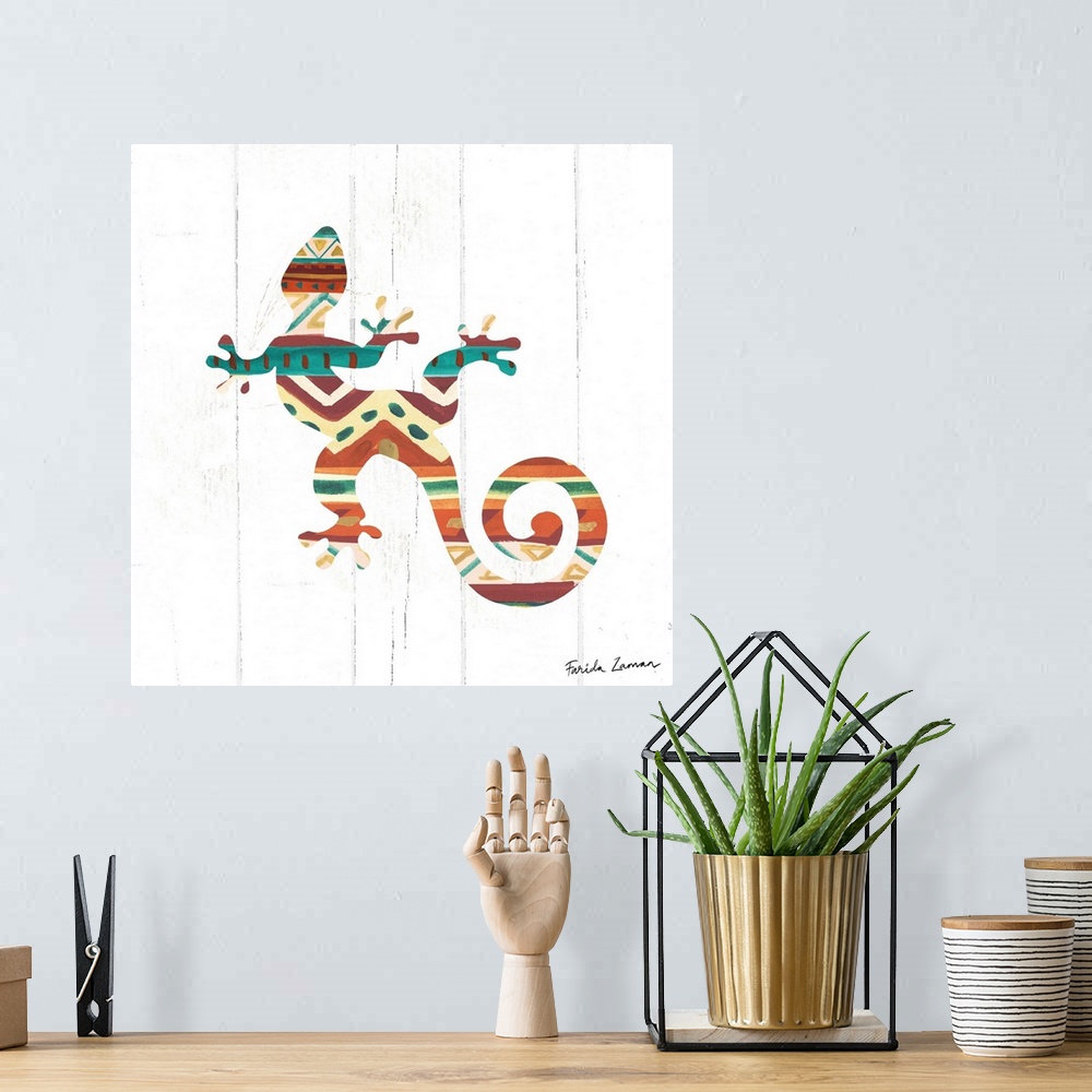 A bohemian room featuring An illustration of a lizard with a southwestern pattern on a white wood panel background.