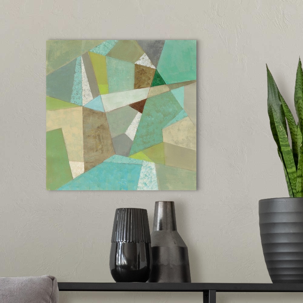 A modern room featuring Contemporary artwork with a retro mid-century vibe of a geometric shapes in various colors.