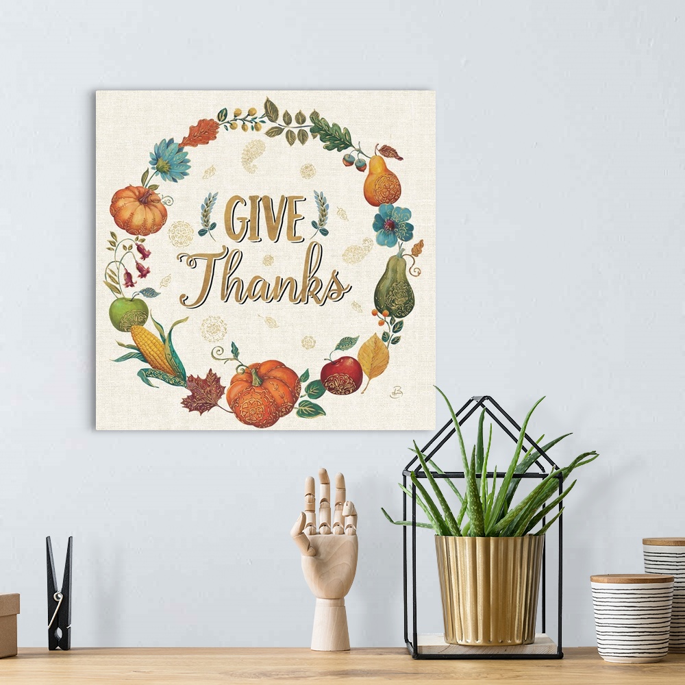 A bohemian room featuring Square illustration of an Autumn harvest wreath with the text "Give Thanks" written in the center...