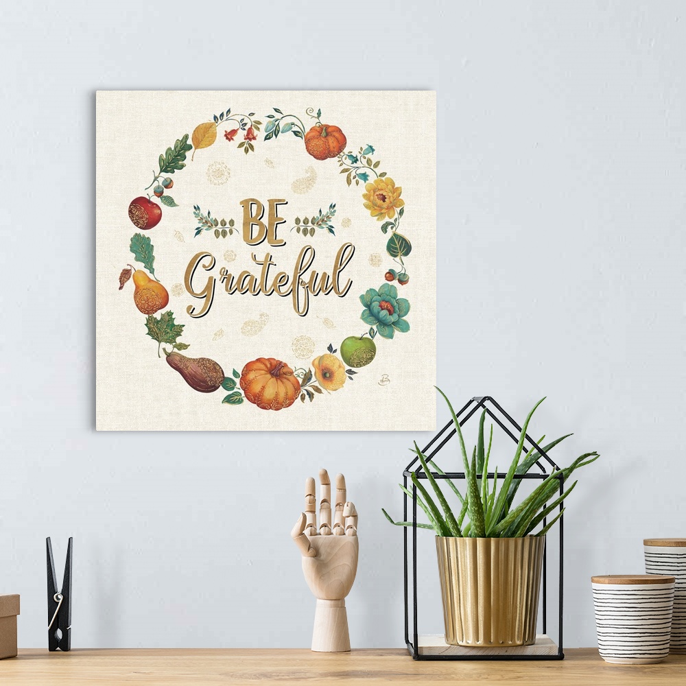 A bohemian room featuring Square illustration of an Autumn harvest wreath with the text "Be Grateful" written in the center...