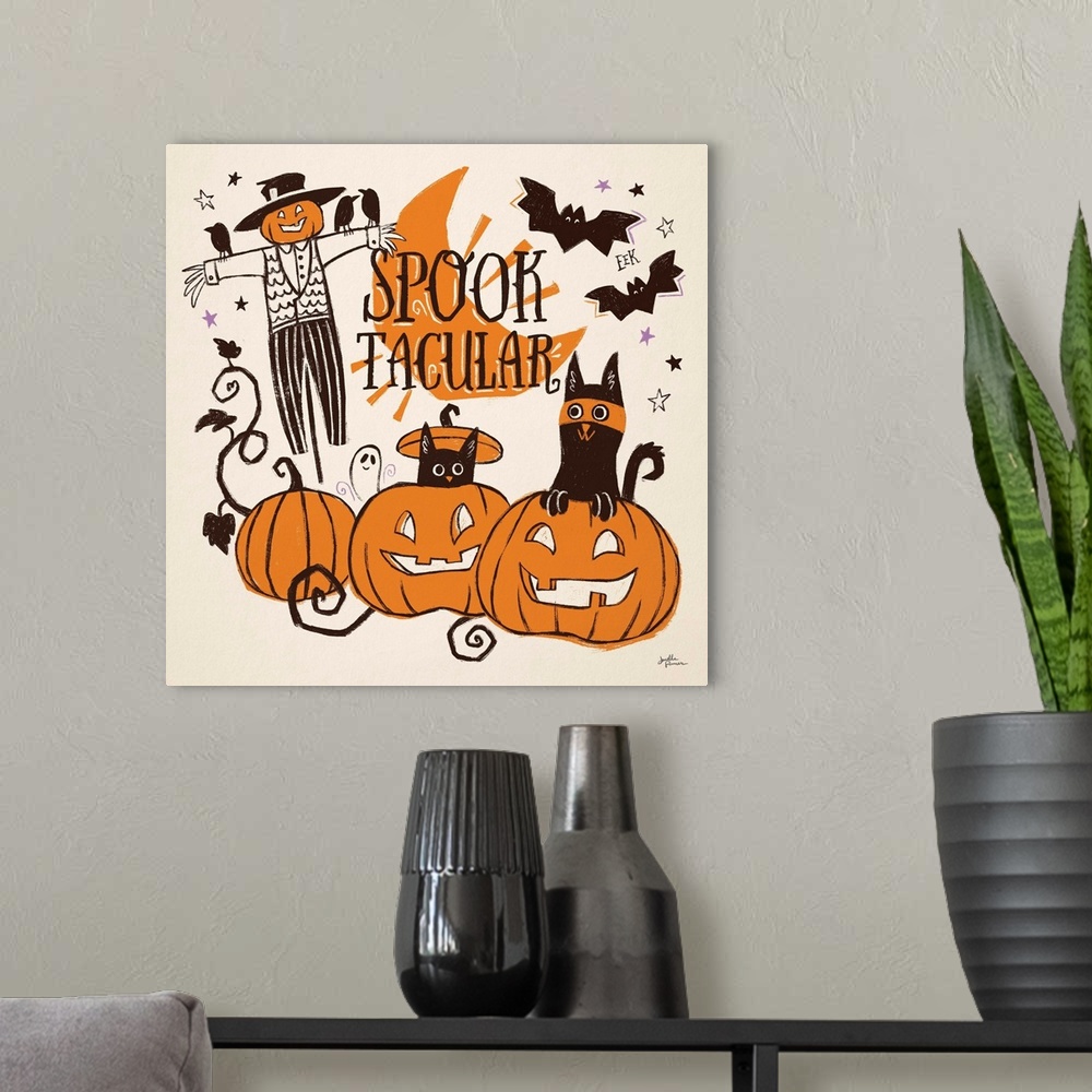 A modern room featuring Decorative Halloween decor featuring whimsical cats over a orange and black themed landscape.