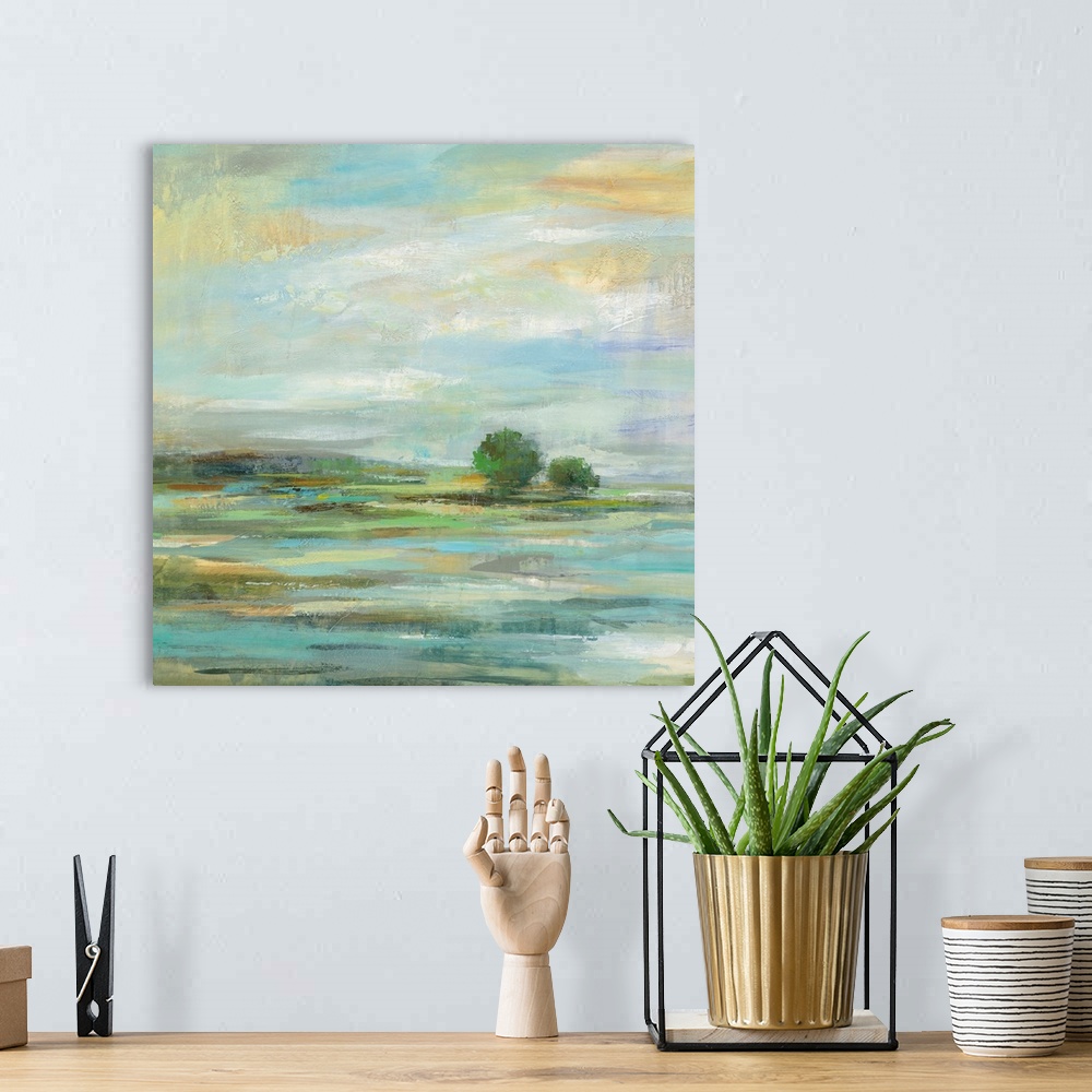 A bohemian room featuring Contemporary painting of a countryside landscape.