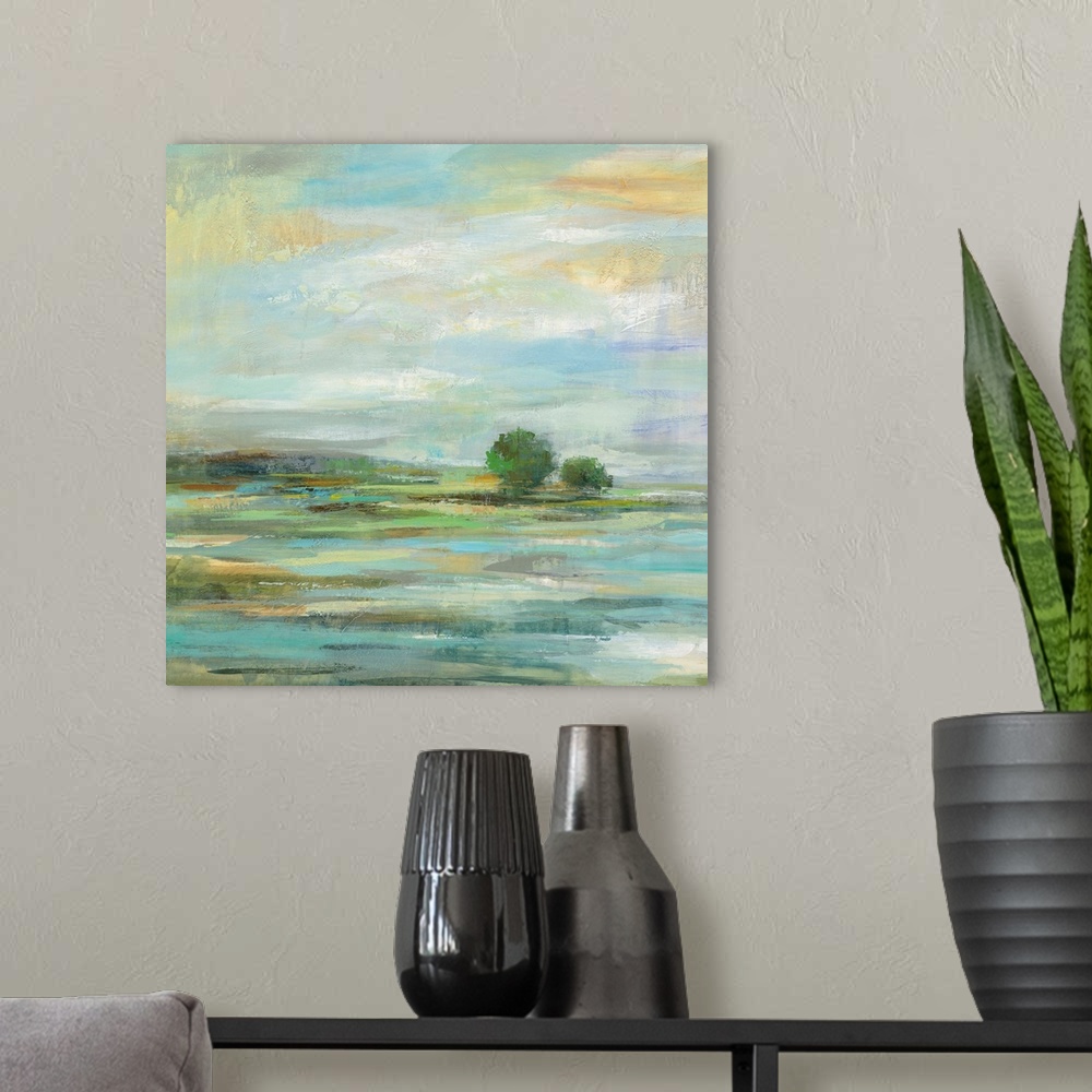 A modern room featuring Contemporary painting of a countryside landscape.