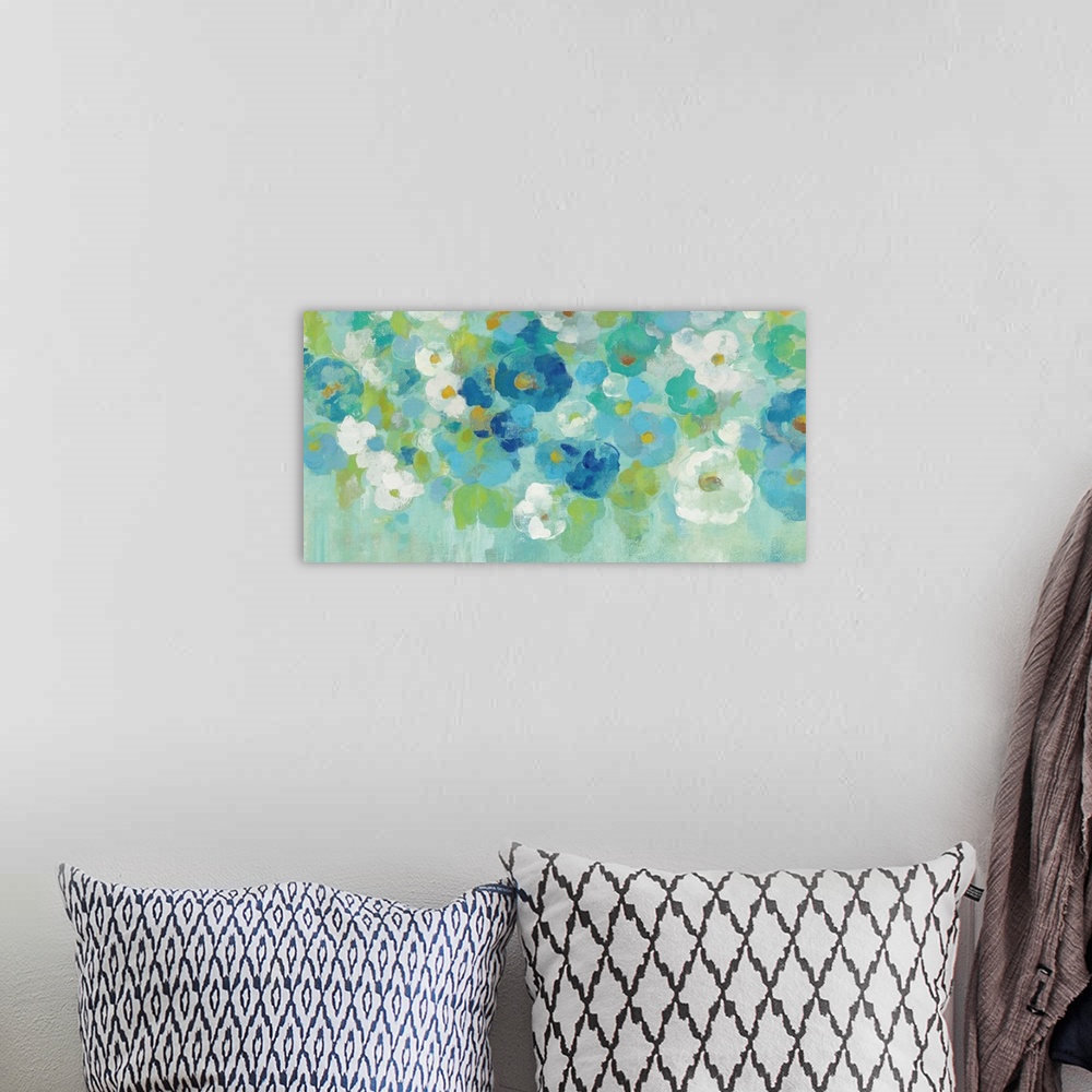 A bohemian room featuring Contemporary painting of blue, green and white flowers against a bright green background.