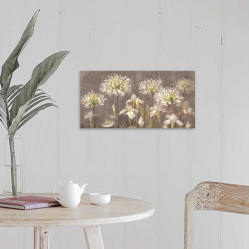 A farmhouse room featuring Contemporary painting of blooming white flowers in a garden.