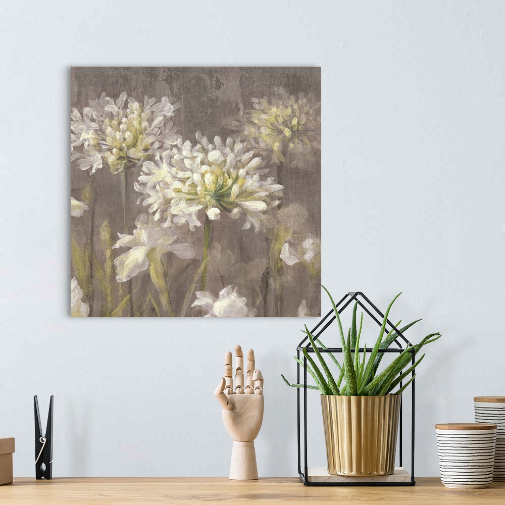A bohemian room featuring Contemporary painting of white flowers on a tan background.