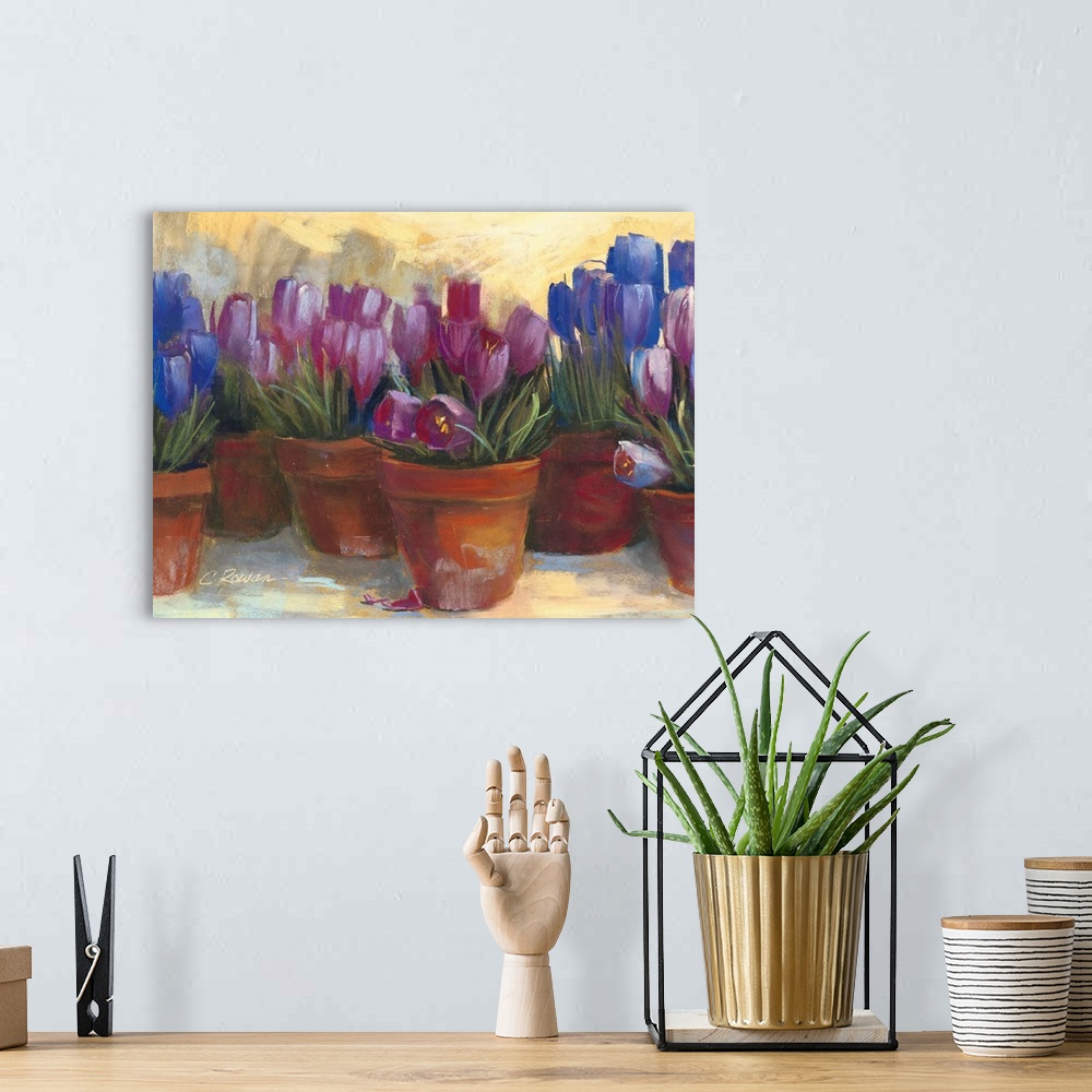A bohemian room featuring Contemporary painting of potted flowers.