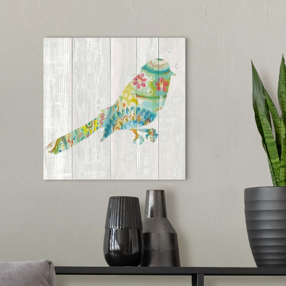 A modern room featuring Colorful paisley patterned bird against a white washed wood plank background.