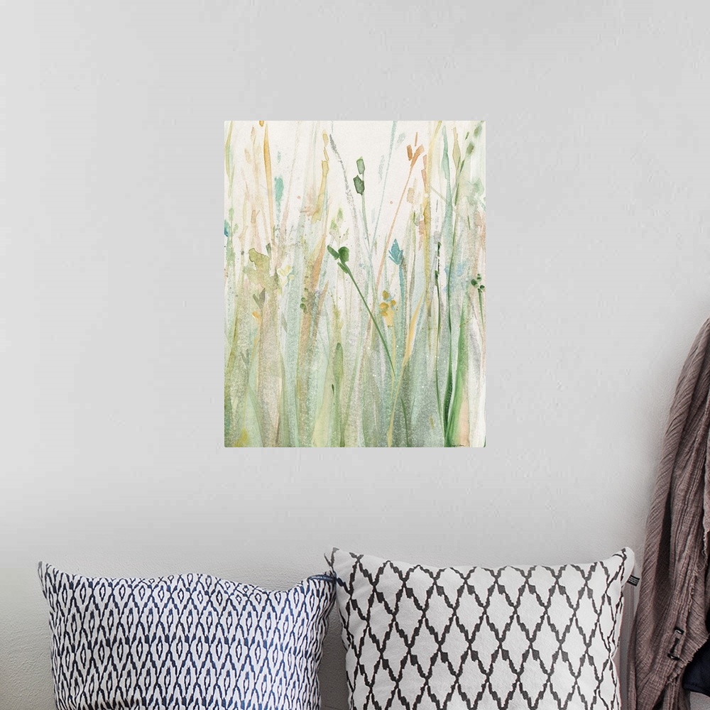 A bohemian room featuring Large watercolor painting of tall, Spring grass in shades of green, yellow, and blue.