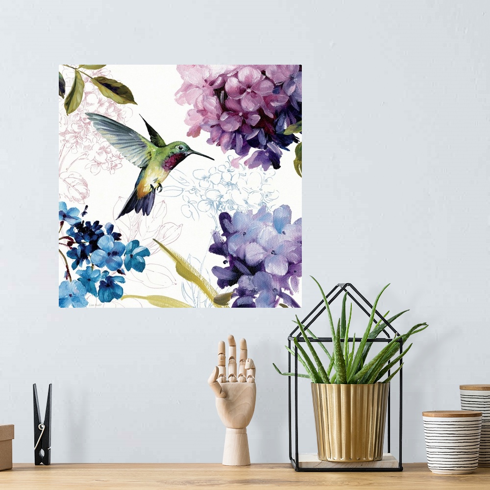 A bohemian room featuring Home docor painting of a hummingbird in flight surrounded by hydrangea flower blooms.