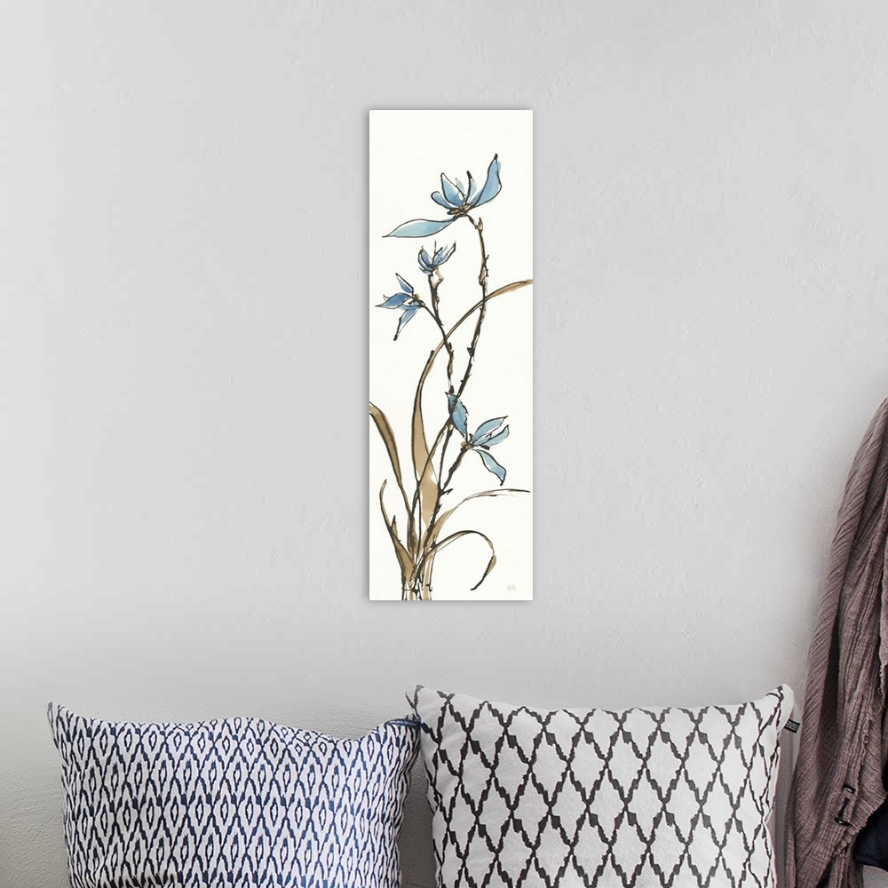 A bohemian room featuring Tall, rectangular watercolor painting of orchids in tan and blue on a solid white background.