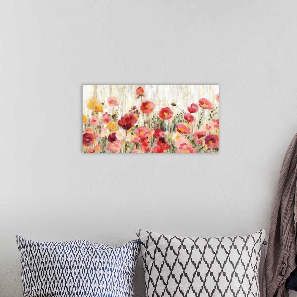 A bohemian room featuring Contemporary painting of warm pink, red, and yellow wildflowers in a field with a streaked backgr...