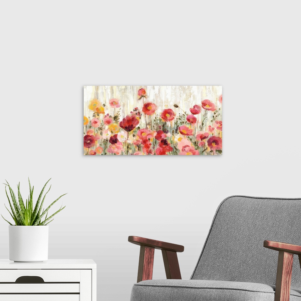 A modern room featuring Contemporary painting of warm pink, red, and yellow wildflowers in a field with a streaked backgr...