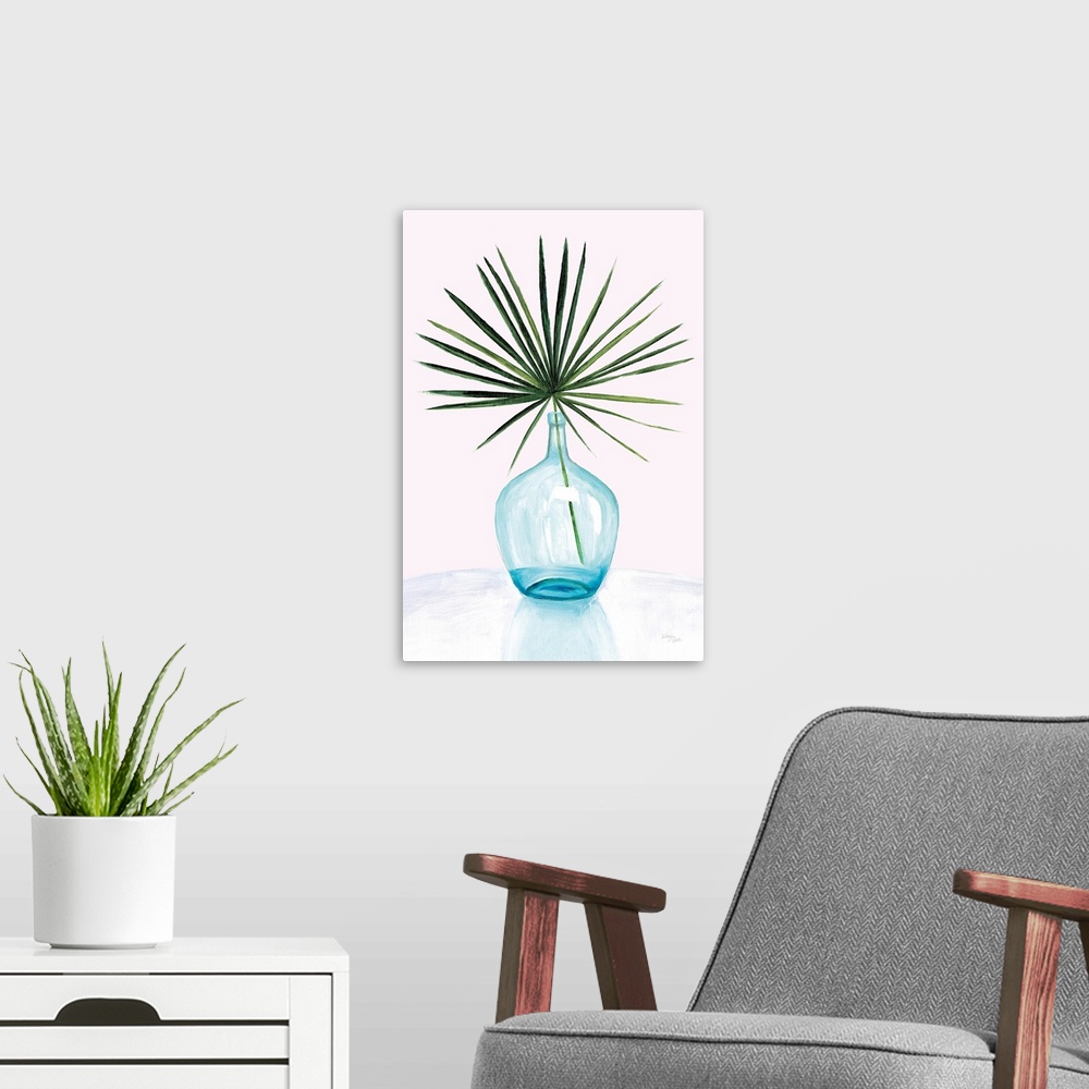 A modern room featuring Vertical contemporary painting of a palm leaf in a glass vase.