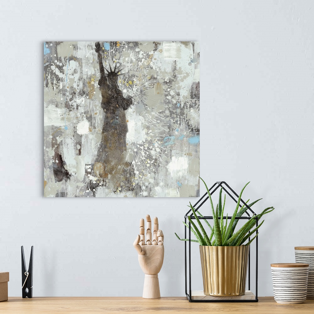 A bohemian room featuring Contemporary painting with paint splatters against the Statue of Liberty in silhouette.