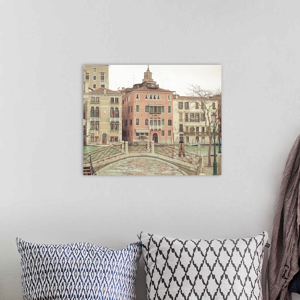A bohemian room featuring Square photograph of a cityscape in Venice, Italy.