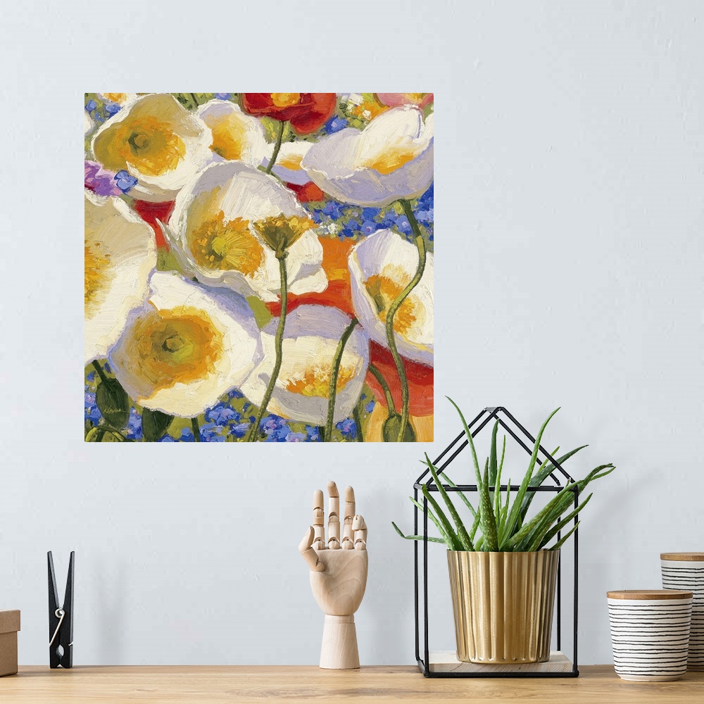 A bohemian room featuring Square painting of various colored flowers on canvas.