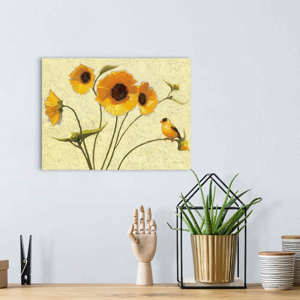 A bohemian room featuring Contemporary painting of bright yellow flowers against a beige background.