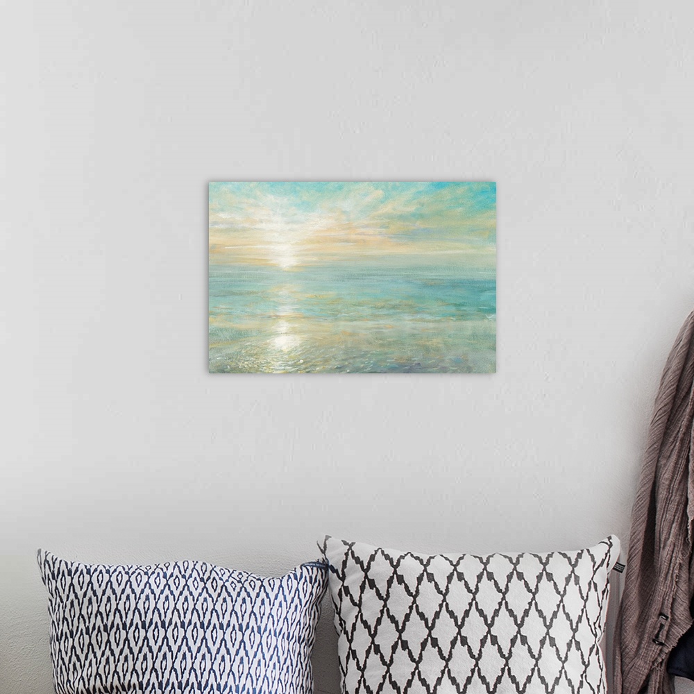 A bohemian room featuring Contemporary artwork of the sun rising over a calm ocean.