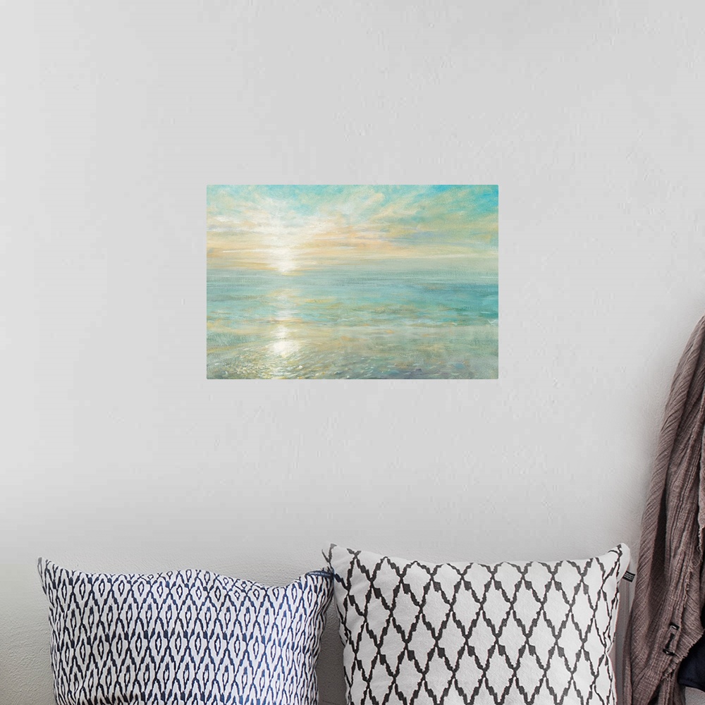 A bohemian room featuring Contemporary artwork of the sun rising over a calm ocean.