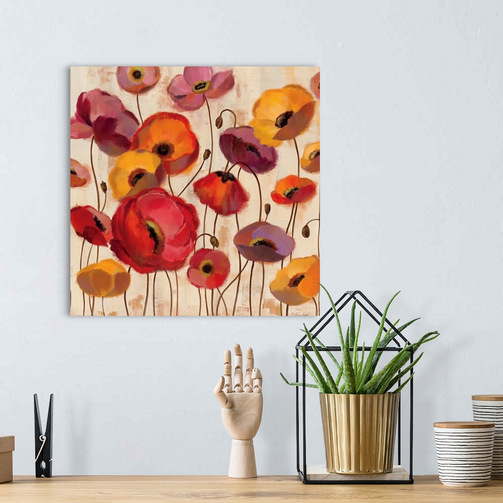 A bohemian room featuring Big canvas painting of various summer colored flowers on a textured background.