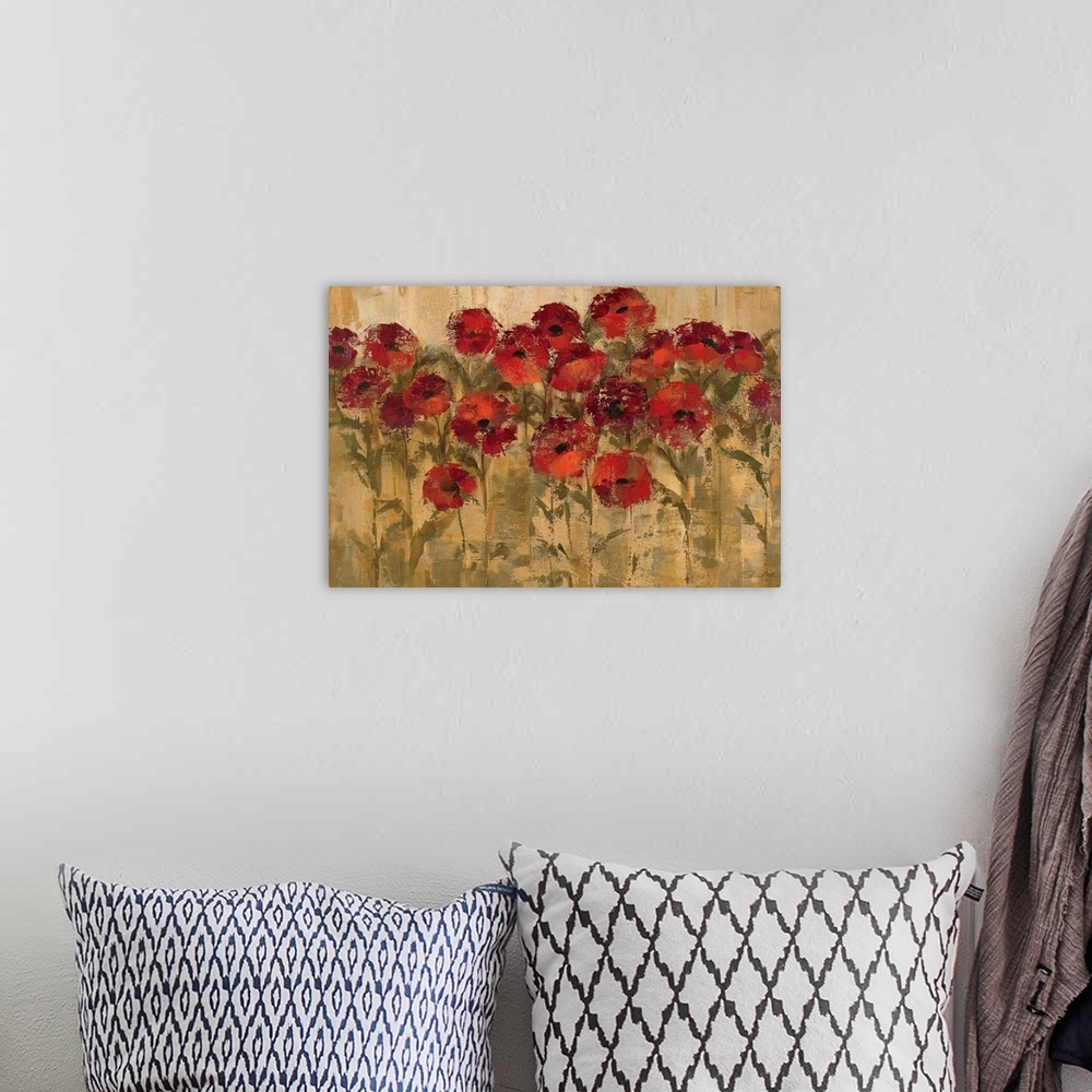 A bohemian room featuring Large wall art of circular warm flowers against a grungy earth toned background.