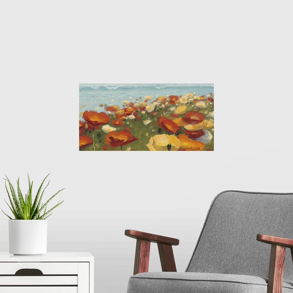 A modern room featuring Brightly colored flowers made up of broad brush strokes overlook the ocean with crashing waves.