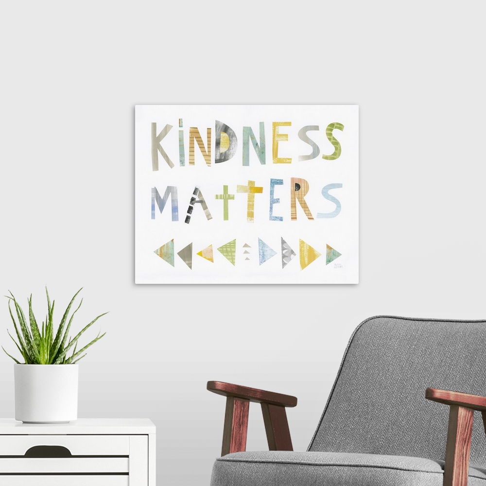 A modern room featuring Whimsy sentiment decor with the phrase "Kindness Matters" written in different colors.