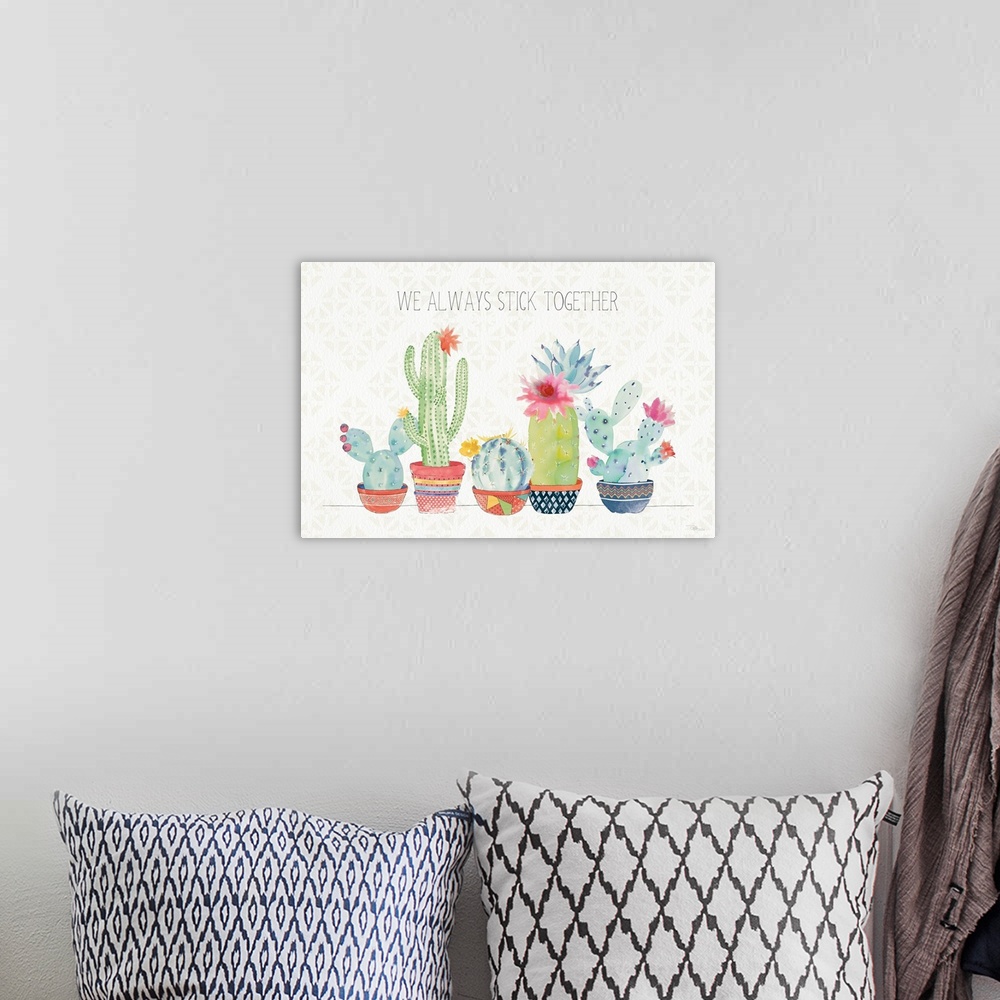 A bohemian room featuring Horizontal decorative artwork of a row of colorful cactus on a neutral background with the text "...